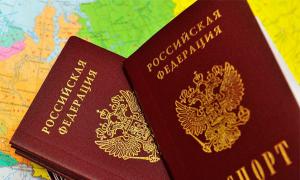 What is the difference between the status of nationality and the status of citizenship?
